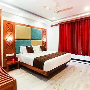 Capital O Hotel Chembarathy Garden Taliparamba Exterior photo